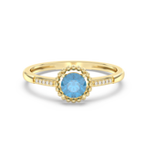 Pierścionek Halo z Niebieskim Topazem