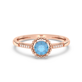 Pierścionek Halo z Niebieskim Topazem