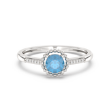 Pierścionek Halo z Niebieskim Topazem