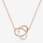 Naszyjnik złoty z brylantami w formie splątanych kółek z różowego złota