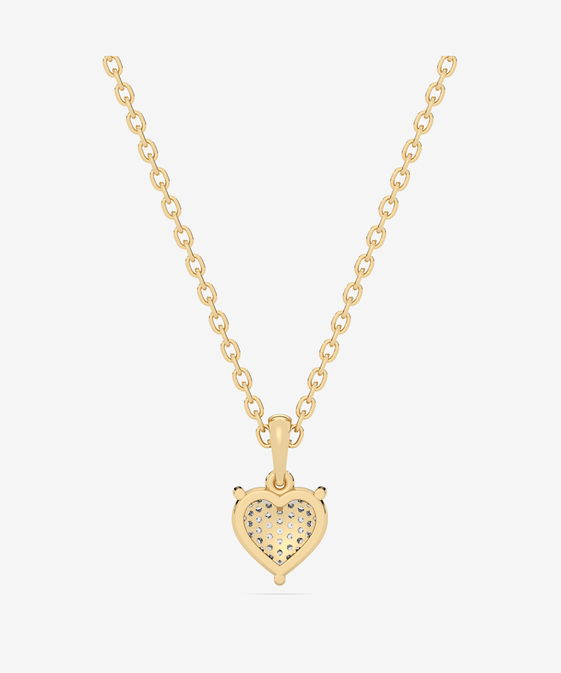 Złota biżuteria z zawieszką z brylantowym sercem, idealna na prezent lub specjalne okazje