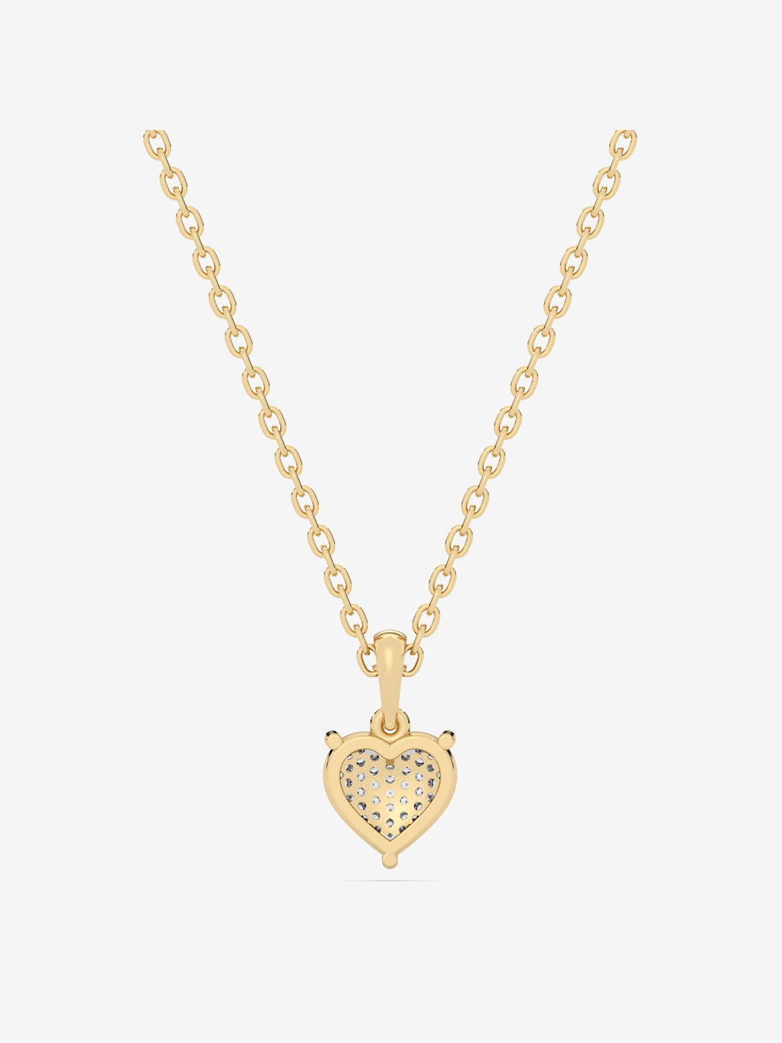 Złota biżuteria z zawieszką z brylantowym sercem, idealna na prezent lub specjalne okazje