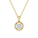 Złota zawieszka okrągła z brylantami na delikatnym łańcuszku, idealna na eleganckie okazje