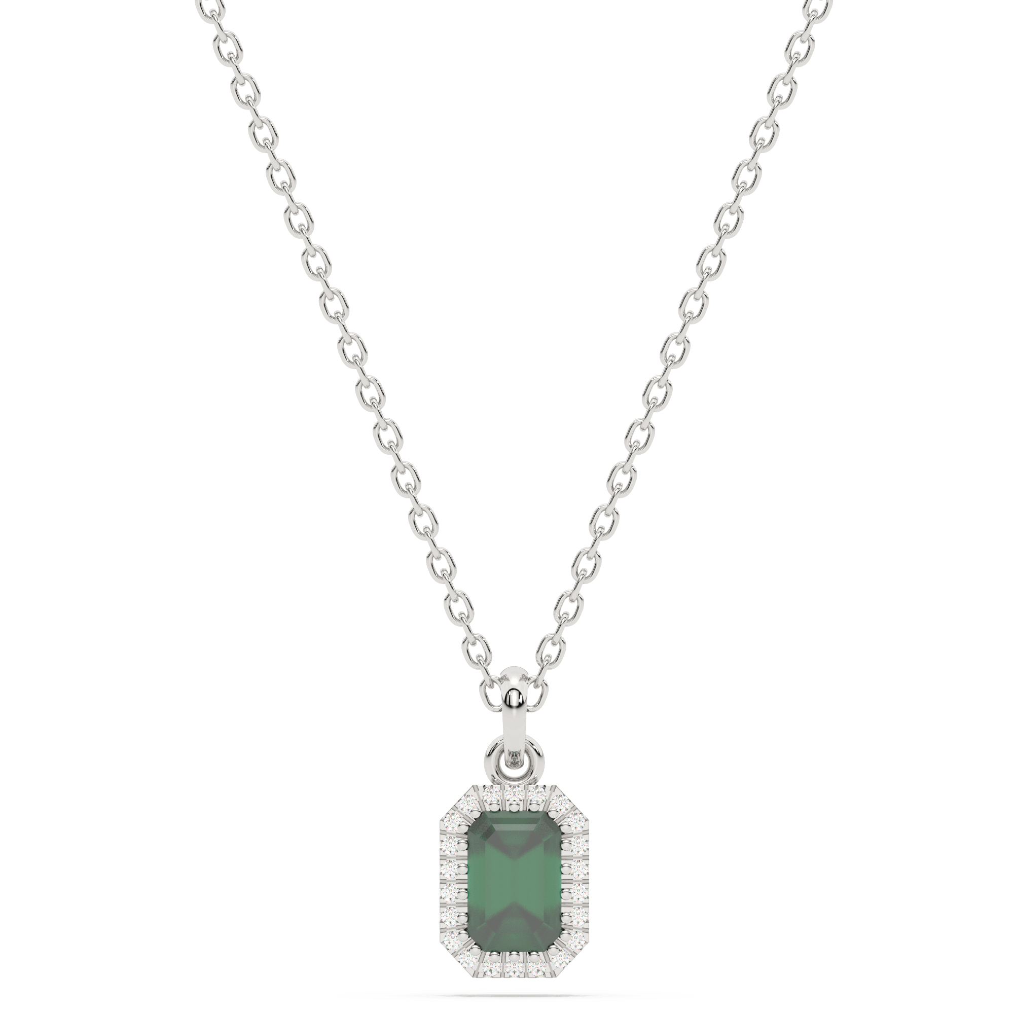 Elegancka złota zawieszka ze szmaragdem w srebrnym naszyjniku, idealna na wyjątkowe okazje
