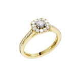 Złoty pierścionek z brylantami o kwiatowym kształcie i subtelnych detalach diamentowych