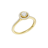 Złoty pierścionek z brylantem halo, zdobiony drobnymi diamentami na obrączce