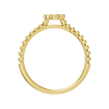 Złoty pierścionek z koniczynką i brylantami o eleganckim wzornictwie i subtelnych detalach