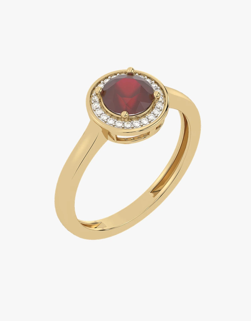 Złoty pierścionek z rubinem otoczony drobnymi diamentami, elegancki i stylowy.