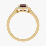 Złoty pierścionek z rubinem o eleganckim designie z delikatnymi detalami