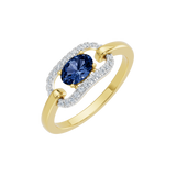 Złoty pierścionek z szafirem i brylantami o eleganckim kształcie i blasku