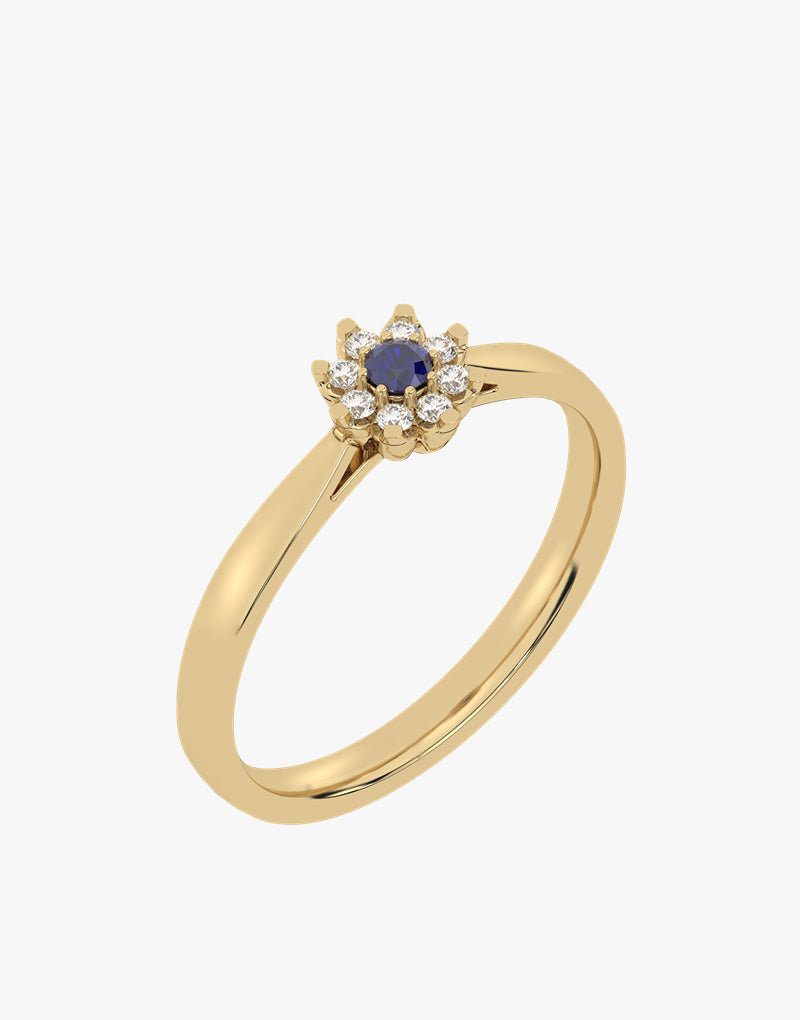 Złoty pierścionek z szafirem otoczony diamentami, elegancka biżuteria od Venetia Jewels
