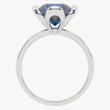 Złoty pierścionek z topazem London Blue z eleganckim szlifem i klasycznym wzornictwem