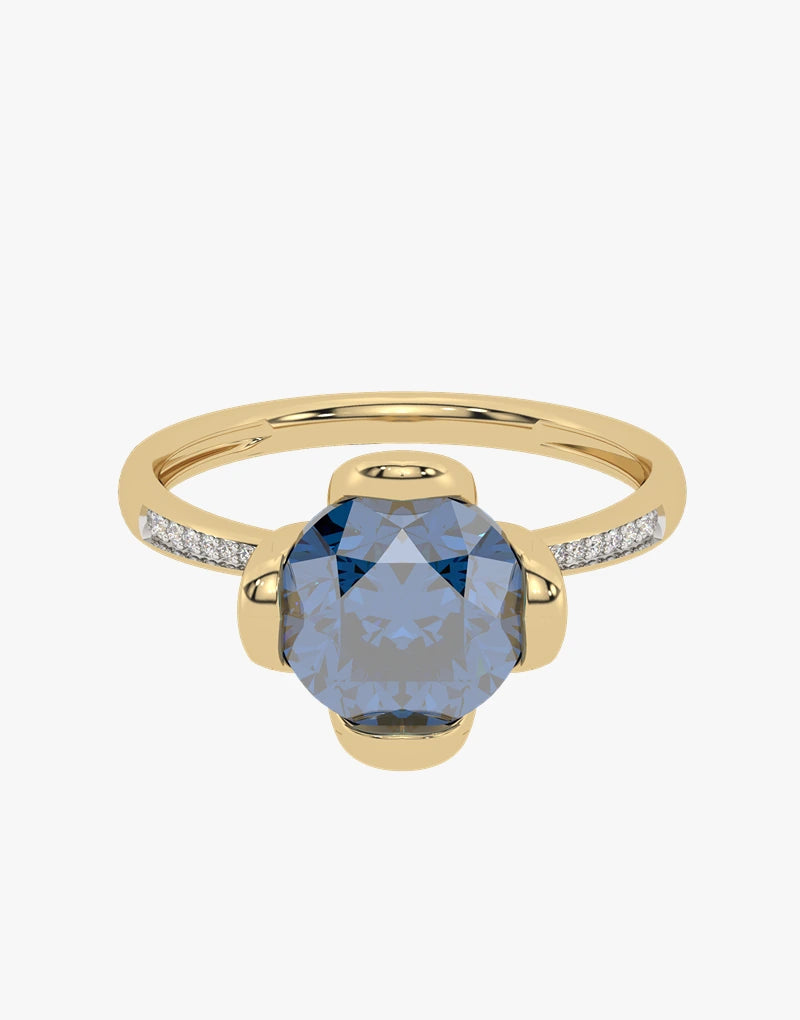 Złoty pierścionek z topazem London Blue i delikatnymi diamentowymi detalami od Venetia Jewels
