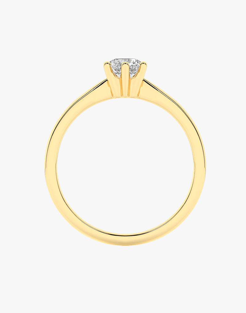 Złoty pierścionek zaręczynowy z brylantem od Venetia Jewels w eleganckim wzornictwie