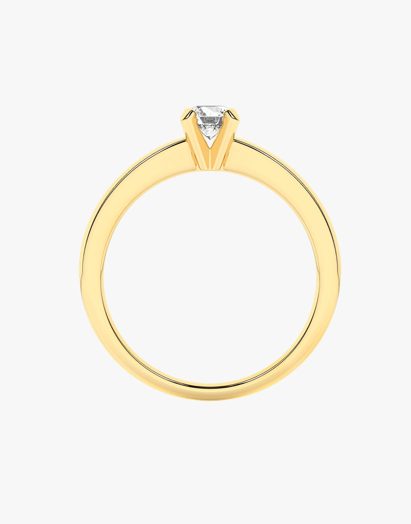 Złoty pierścionek zaręczynowy z brylantem o eleganckim designie, idealny na specjalne okazje
