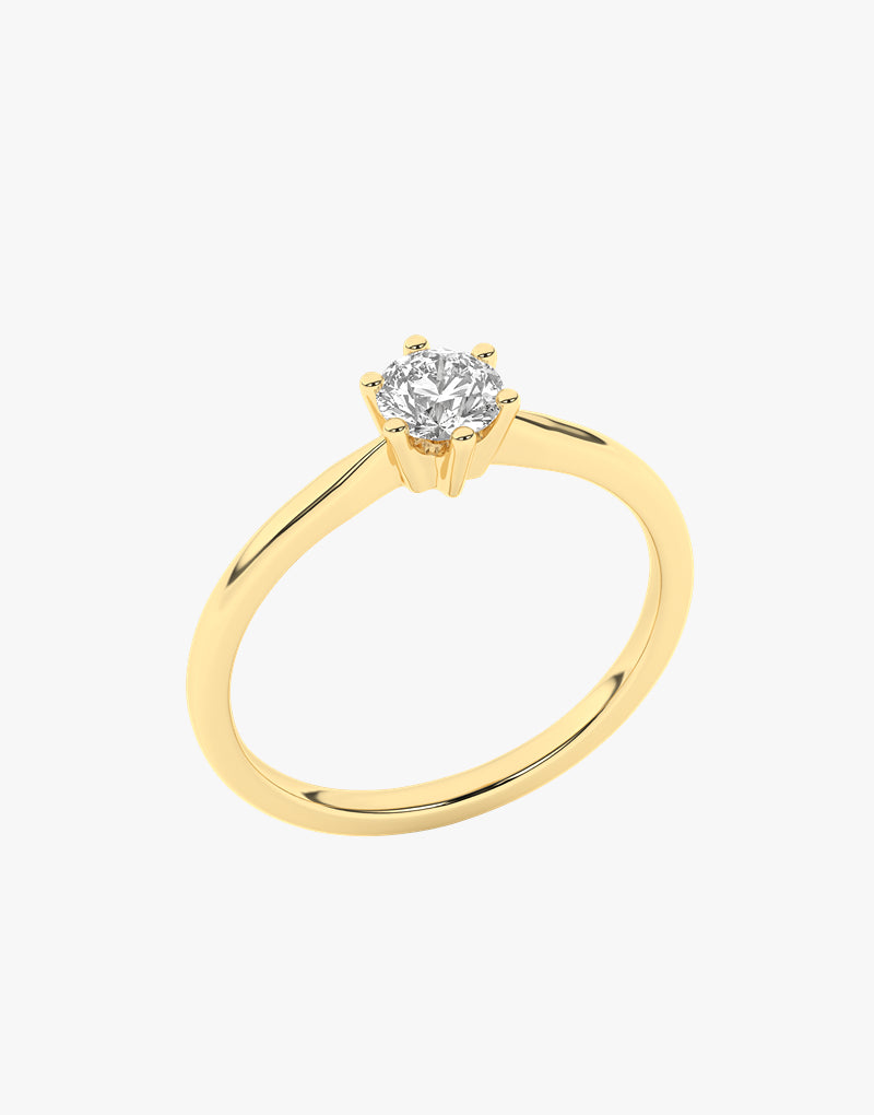 Złoty pierścionek zaręczynowy z brylantem w minimalistycznym stylu od Venetia Jewels
