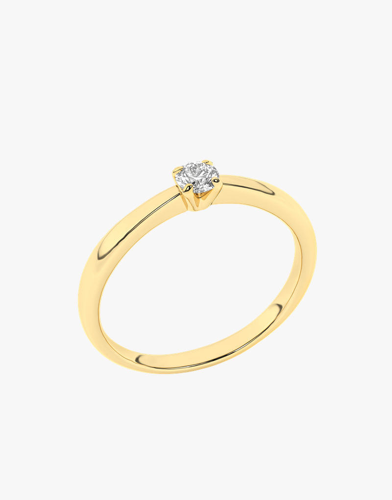 Złoty pierścionek zaręczynowy z brylantem od Venetia Jewels, elegancka biżuteria idealna na zaręczyny.