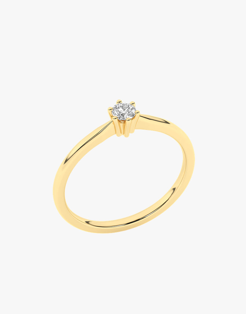 Złoty pierścionek zaręczynowy z brylantem od Venetia Jewels, elegancki i romantyczny design