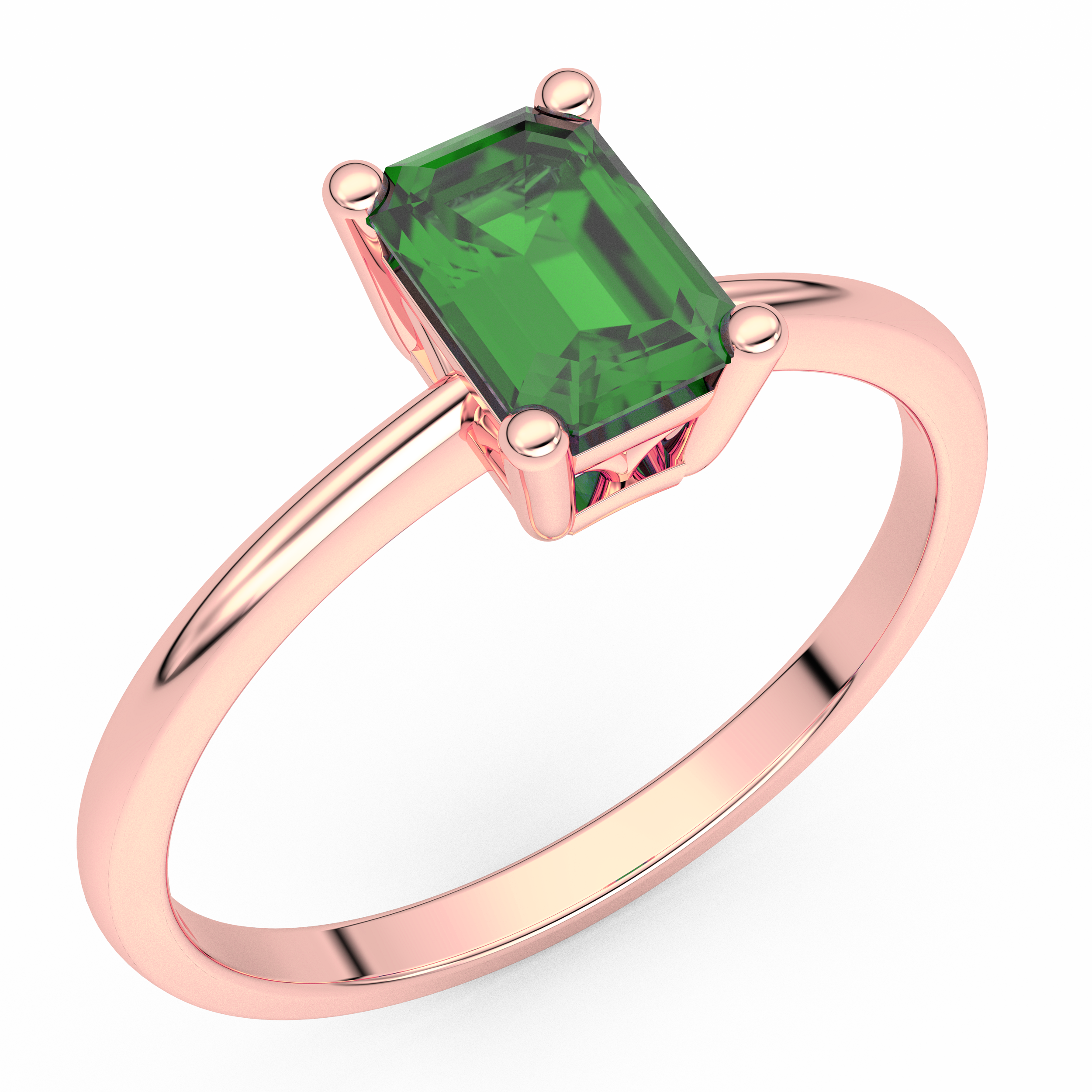 Złoty pierścionek zaręczynowy ze szmaragdem w różowym gold z prostokątnym kamieniem szlachetnym