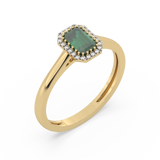 Złoty pierścionek ze szmaragdem otoczony diamentami w eleganckim designie od Venetia Jewels