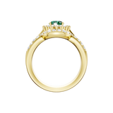 Złoty pierścionek ze szmaragdem i brylantami z eleganckim wykończeniem, idealny na wyjątkowe okazje