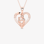 Złoty wisiorek serce z brylantami z motywem matki i dziecka, elegancki i romantyczny dodatek