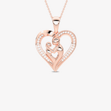Złoty wisiorek serce z brylantami z motywem matki i dziecka, elegancki i romantyczny dodatek