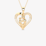 Złoty wisiorek serce z brylantami od Venetia Jewels z delikatnym wzorem matki i dziecka