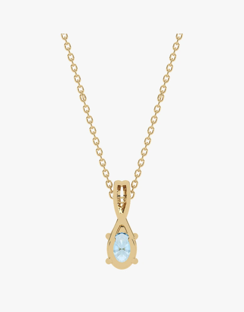 Złoty wisiorek z niebieskim topazem zawieszony na delikatnym łańcuszku od Venetia Jewels