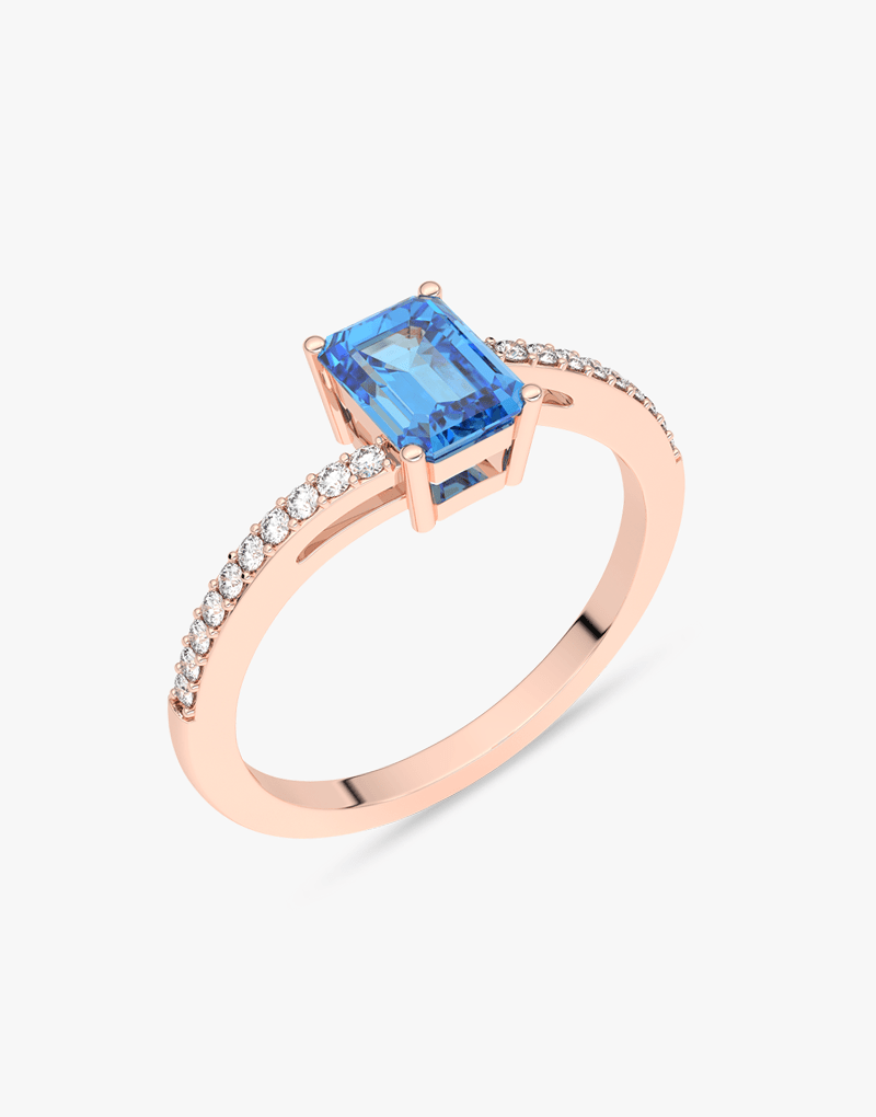 Elegancki pierścionek z topazem i brylantami na różowym złocie, idealny na specjalne okazje