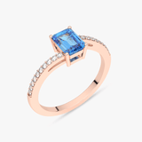 Elegancki pierścionek z topazem i brylantami na różowym złocie, idealny na specjalne okazje