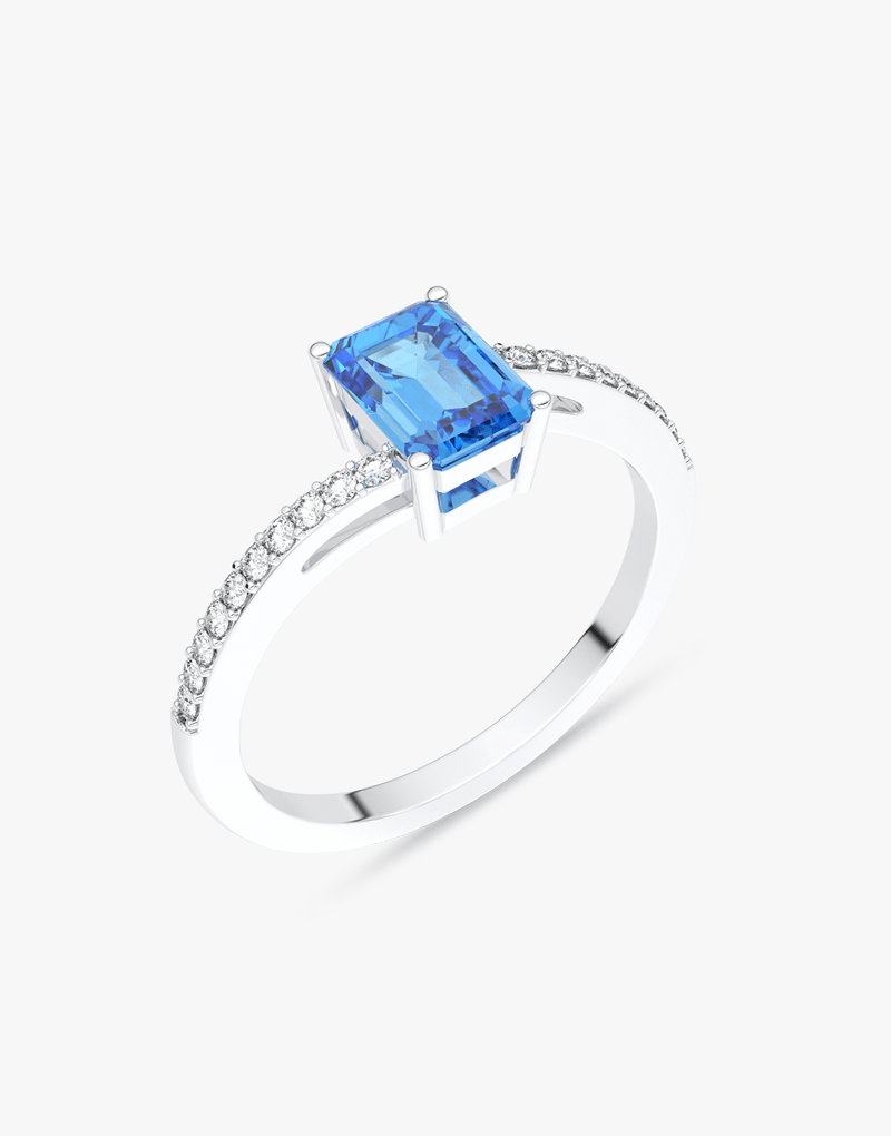 Srebrny pierścionek z topazem i brylantami z prostokątnym niebieskim kamieniem