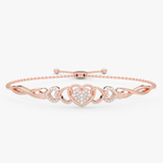 Bransoletka z brylantem serce w różowym złocie z delikatnym wzorem i migoczącymi kamieniami