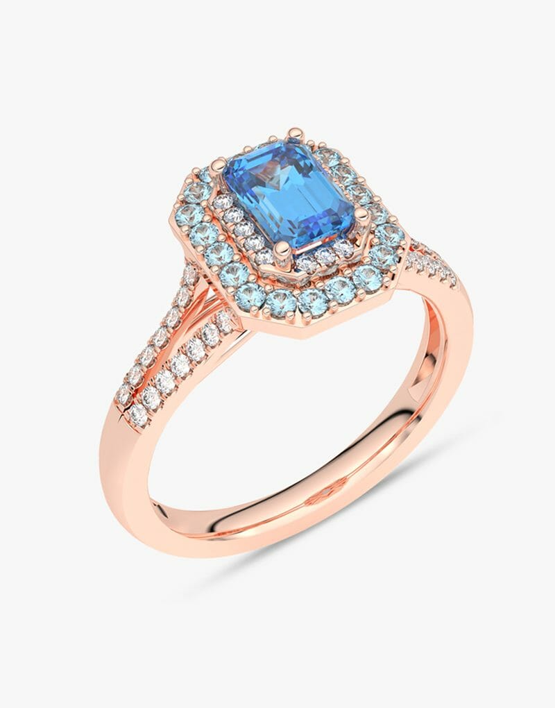 Pierścionek z niebieskim topazem i brylantami w różowym złocie, elegancki i stylowy