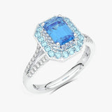 Elegancki pierścionek z niebieskim topazem i brylantami w srebrnej oprawie od Venetia Jewels