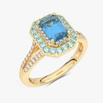 Złoty pierścionek z niebieskim topazem i brylantami w eleganckim designie dla miłośników biżuterii