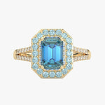 Elegancki pierścionek z niebieskim topazem i brylantami w złotej oprawie od Venetia Jewels