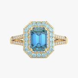 Elegancki pierścionek z niebieskim topazem i brylantami w złotej oprawie od Venetia Jewels