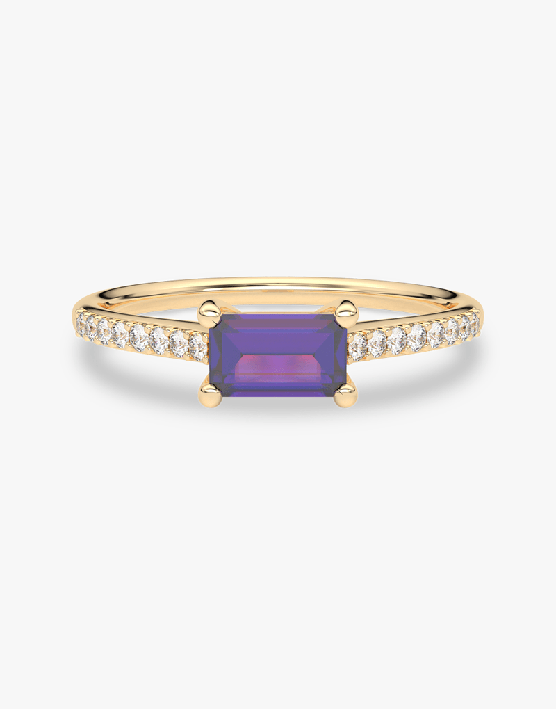 Pierścionek vintage z tanzanitem i brylantami w złotej oprawie, elegancki dodatek dla każdego.