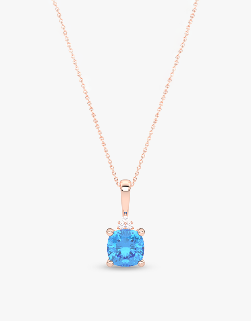 Wisiorek z niebieskim topazem na różowym łańcuszku z delikatnymi kryształkami dla eleganckich stylizacji