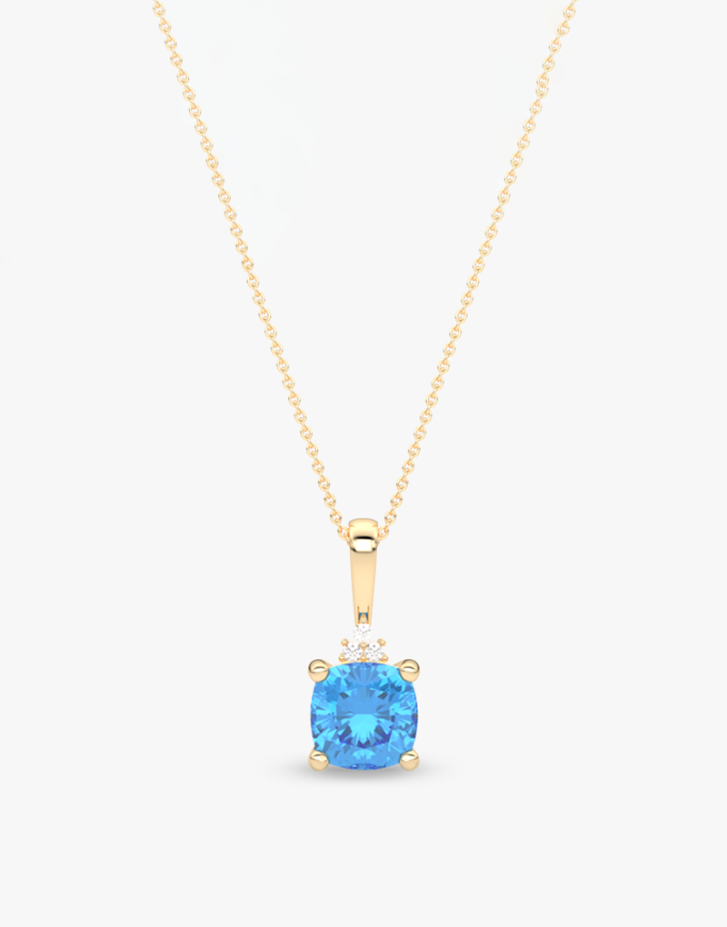 Wisiorek z niebieskim topazem na złotym łańcuszku, elegancki dodatek do każdej stylizacji
