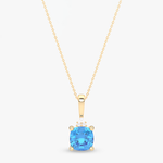 Wisiorek z niebieskim topazem na złotym łańcuszku, elegancki dodatek do każdej stylizacji