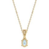 Złoty wisiorek z Niebieskim Topazem i brylantami