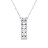 Złota zawieszka z pionową brylantową kompozycją