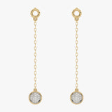 Gold earrings hanging with diamonds 