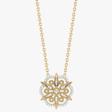 Gold necklace with flower pendant and diamond accent