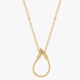 Gold drop-shaped pendant with diamonds