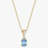 Gold pendant with Blue Topaz and diamonds