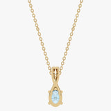 Gold pendant with Blue Topaz and diamonds