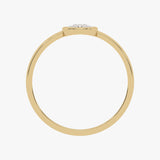 Gold ring with round bezel and white diamonds